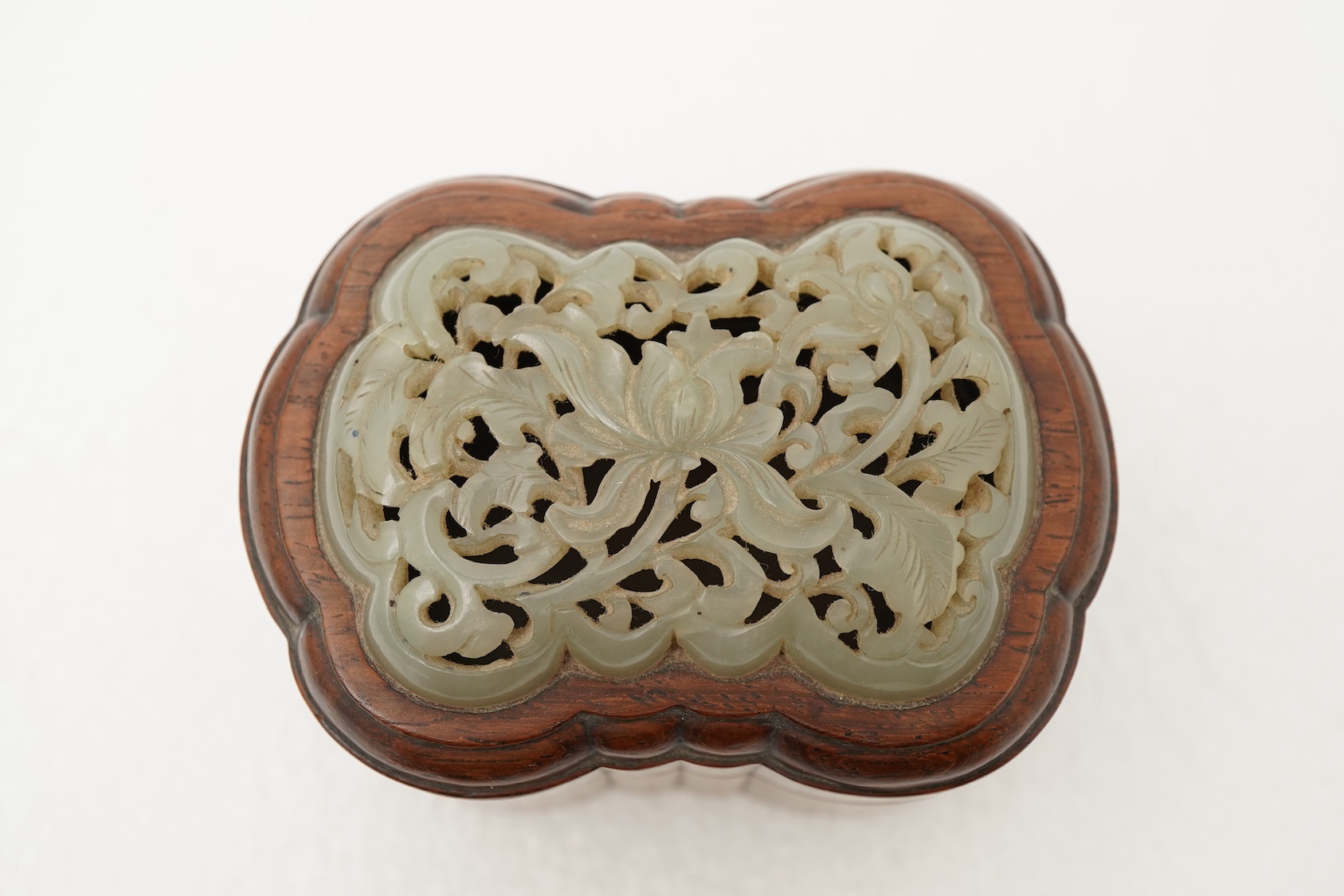 A Chinese jade mounted huanghuali box and cover, 19th century
